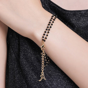 Estele Gold Plated Fascinating "A" Alphabet with Black Beads Bracelet for Women