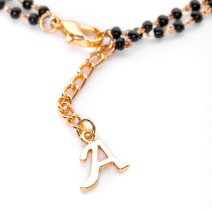 Estele Gold Plated Fascinating "A" Alphabet with Black Beads Bracelet for Women
