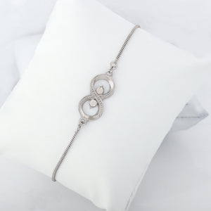 Estele Rodium Plated Eternal Knot Bracelet With Austrian Crystals For Men & Women