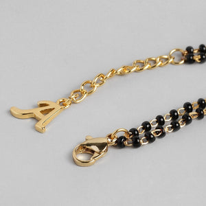 Estele Gold Plated Fascinating "A" Alphabet with Black Beads Bracelet for Women