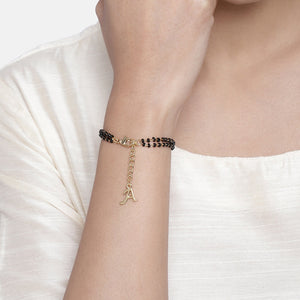 Estele Gold Plated Fascinating "A" Alphabet with Black Beads Bracelet for Women