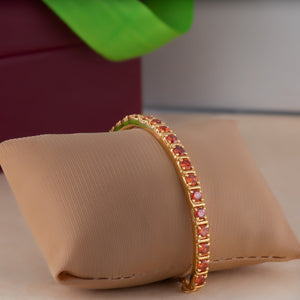 Estele  Gold Plated Candy Bracelet with Orange American Diamonds Bracelet (adjustable)