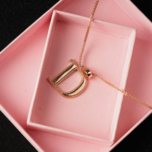 Estele - Charm D Rosegold plated Pendant